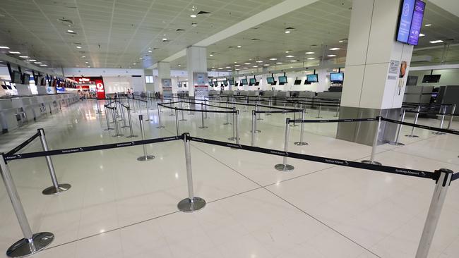 The empty check-in area at Sydney International Airport on Wednesday. Picture: Mark Metcalfe/Getty Images