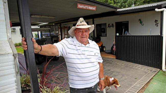 Hartley now lives a recluse life on the banks of the Hawkesbury River at Leetsvale. Pictured with his dog Elly enjoying the quiet life. Picture: Toby Zerna