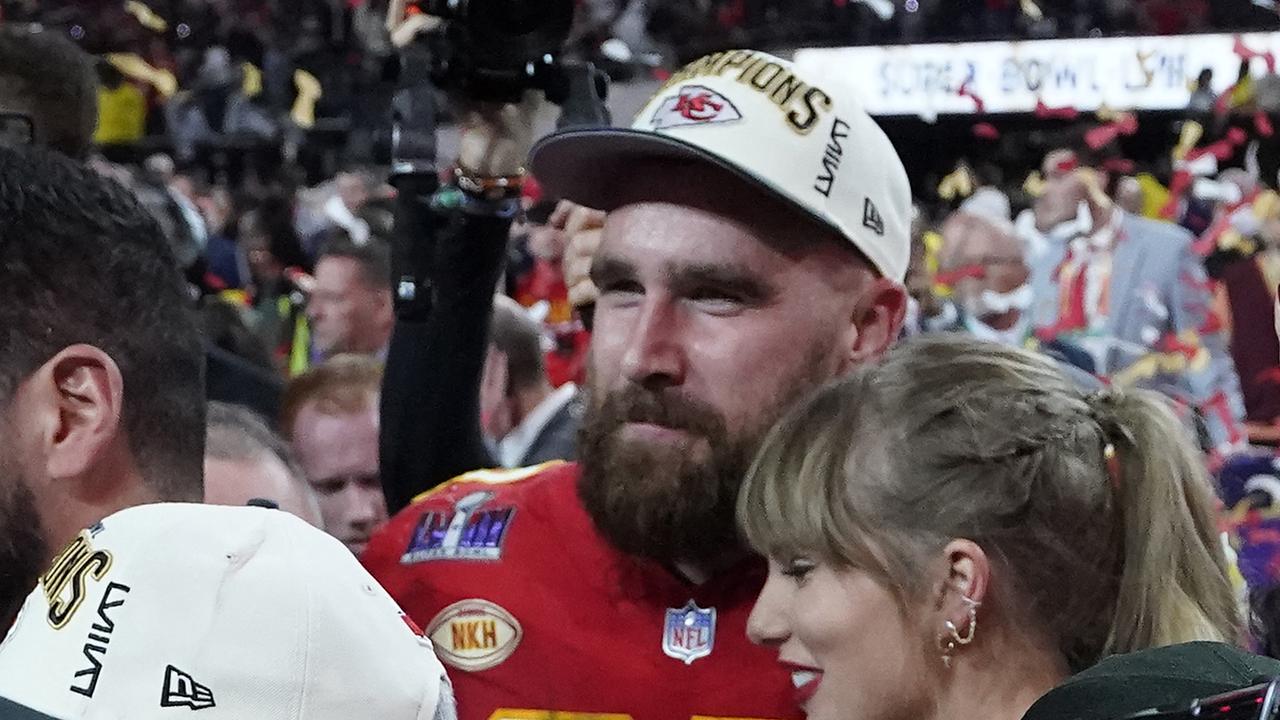 Travis Kelce and US singer-songwriter Taylor Swift. (Photo by TIMOTHY A. CLARY / AFP)