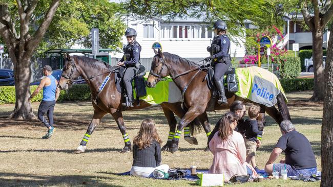 Queensland Police Mounted Unit patrolling New Farm Park on Saturday. Picture: Richard Walker