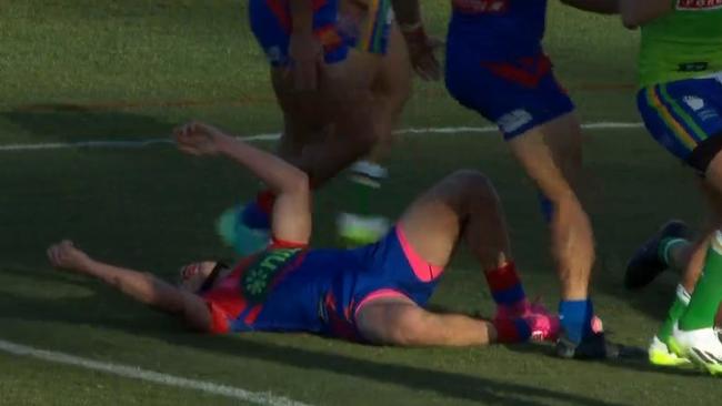 Kalyn Ponga fell hard to the turf in a clumsy Raiders tackle.