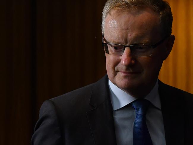 Governor of the Reserve Bank of Australia (RBA) Phillip Lowe arrives to speak to the media during a press conference in Sydney, Tuesday, April 21, 2020. (AAP Image/Joel Carrett) NO ARCHIVING