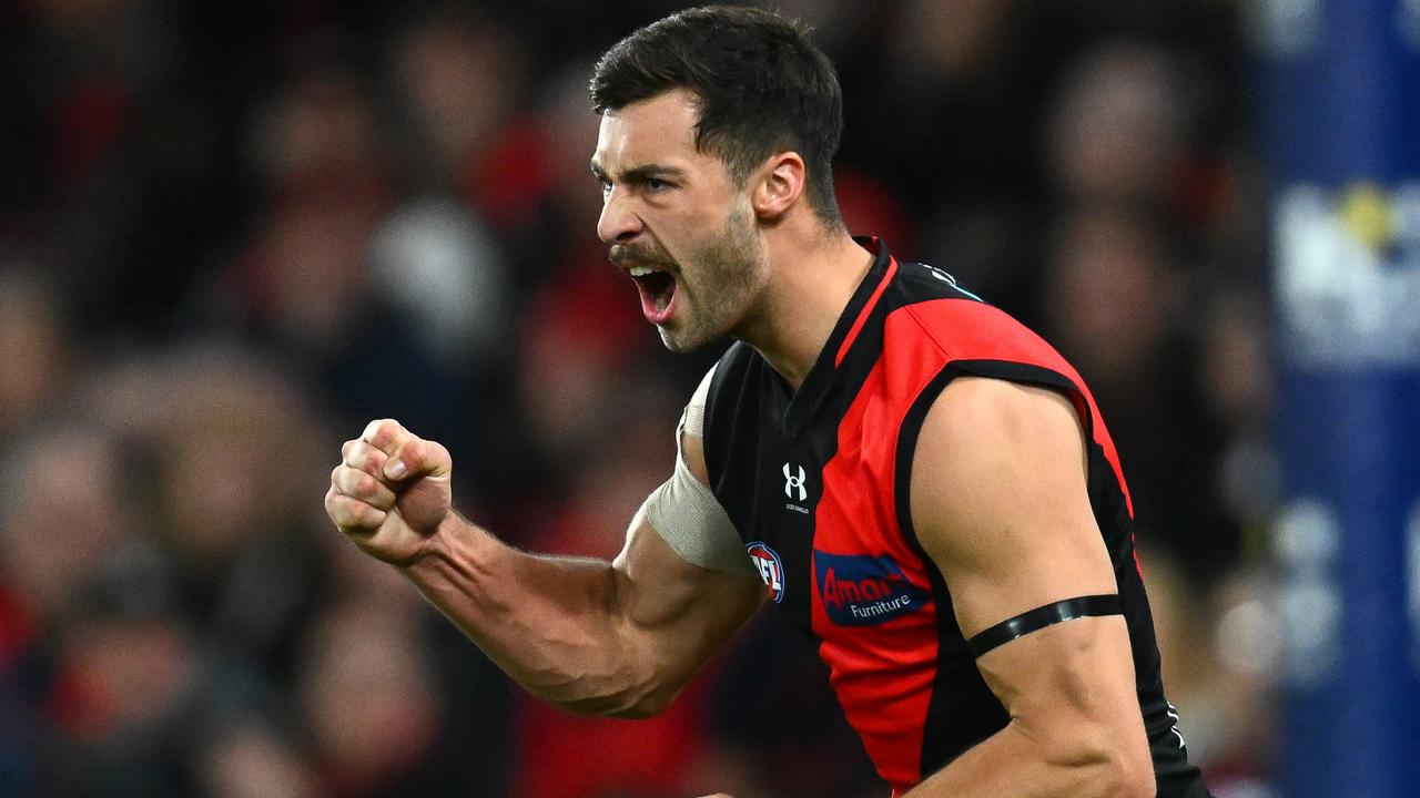 MELBOURNE, AUSTRALIA - JUNE 04: Kyle Langford of the Bombers celebrates kicking a goal during the round 12 AFL match between Essendon Bombers and North Melbourne Kangaroos at Marvel Stadium, on June 04, 2023, in Melbourne, Australia. (Photo by Quinn Rooney/Getty Images)