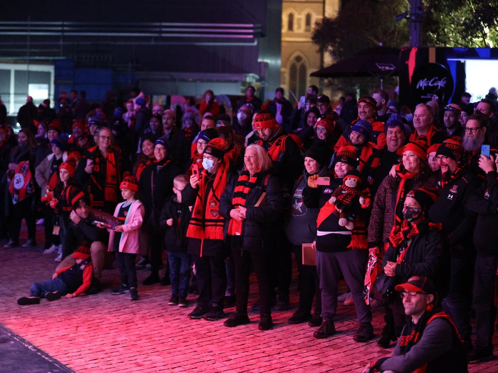 Essendon fans gathered at Fed Square with club legends Mark Harvey, Simon Madden, Kevin Sheedy and Terry Daniher, among other past players celebrating the Bombers’ big milestone. Picture: Jason Edwards