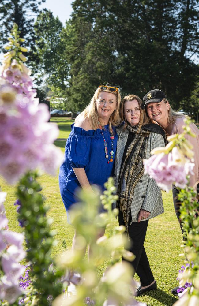 Admiring the flowers are (from left) Fiona Kingsford, Julie Appleby and Kath Boschen in Queens Park for Carnival of Flowers, Saturday, September 21, 2024. Picture: Kevin Farmer