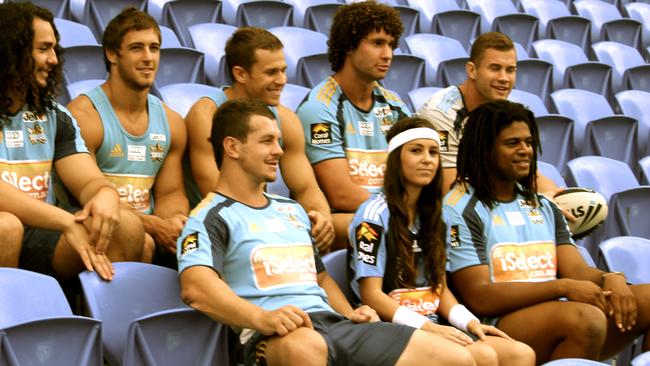 Amy Shark with Titans players during her time at the club.