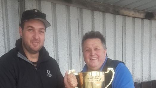 Mark and his son Dylan with the Collie Cup in 2018.