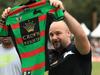 Glenn Stewart is presented with his jersey before the Back to Redfern pre-season game between Souths and Northern Pride at Redfern Oval. pic Mark Evans
