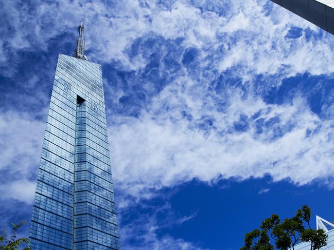 Hakata, Japan - August 22, 2015: There is a Fukuoka Tower on the left side and srounding architectures of it. The tower is 234 m heights and in Sawara-Ku, Fukuoka City, Fukuoka Pref., Japan.