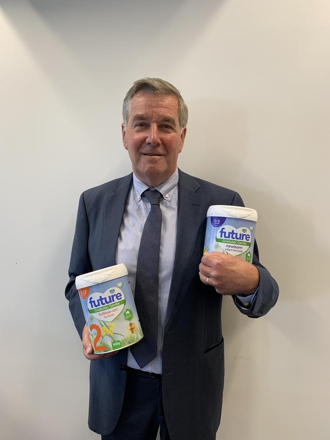 Martin Bryant holds cans of its Gradulac tummy health formula today.