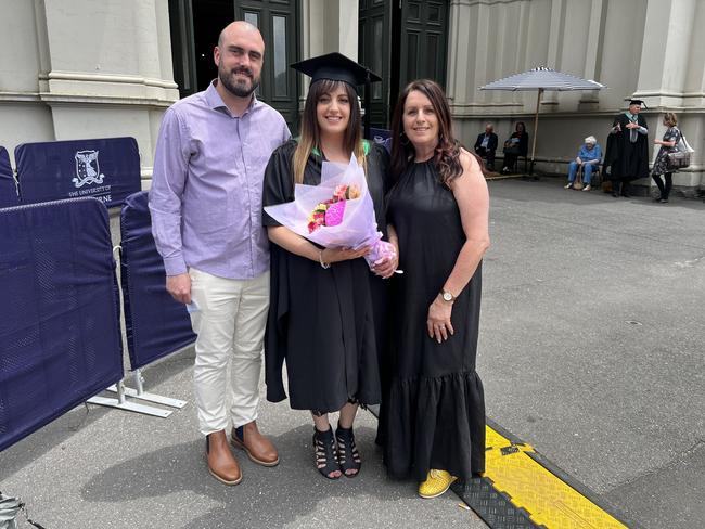 Michael Cahill, Ashleigh Cahill (Master of Education) and Iris Zammit at the University of Melbourne graduations held at the Royal Exhibition Building on Saturday, December 14, 2024. Picture: Jack Colantuono