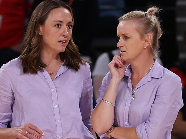 SYDNEY, AUSTRALIA - APRIL 01: Head Coach Bec Bulley and Assistant Coach Lauren Brown of the Firebirds talk after the game during the round three Super Netball match between NSW Swifts and Queensland Firebirds at Ken Rosewall Arena, on April 01, 2023, in Sydney, Australia. (Photo by May Bailey/Getty Images)