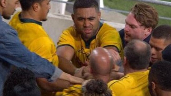 Lukhan Tui confronts an angry fan after the Wallabies loss.