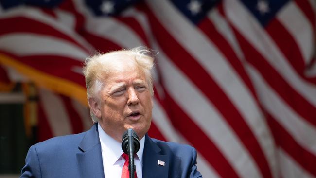 US President Donald Trump speaks prior to signing an executive order on police reform in the Rose Garden of the White House in Washington.