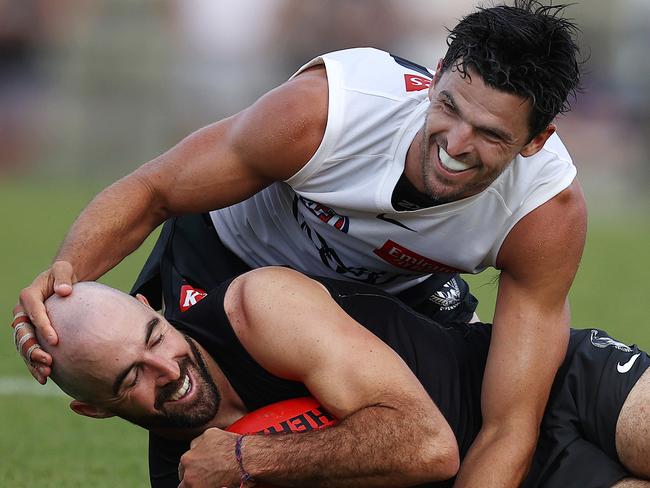 MELBOURNE . 17/02/2023.  AFL . Collingwood intra club practise match at Olympic Park.  Scott Pendlebury has a laugh with Steele Sidebottom after running him down during the 4th qtr.   . Pic: Michael Klein