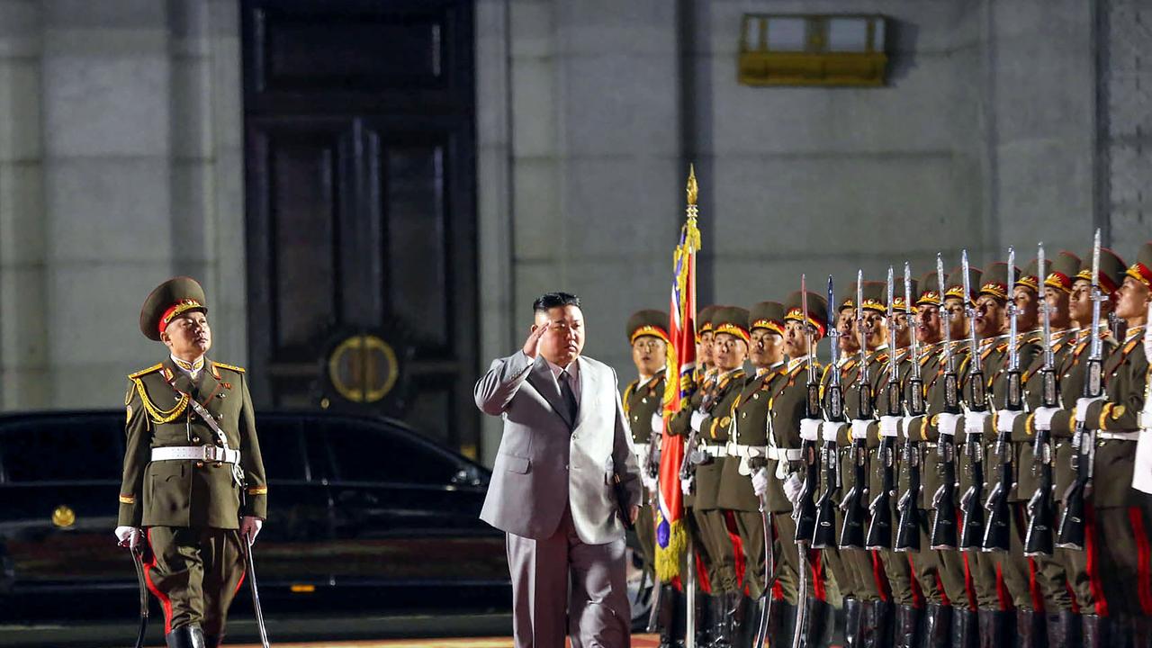 North Korean leader Kim Jong-un inspects the ceremonial guard. Picture: AFP