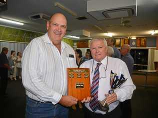 Condamine Sports Club president Ross Bell presents the volunteer award to Wattles rugby league president Glyn Rees. Picture: Gerard Walsh