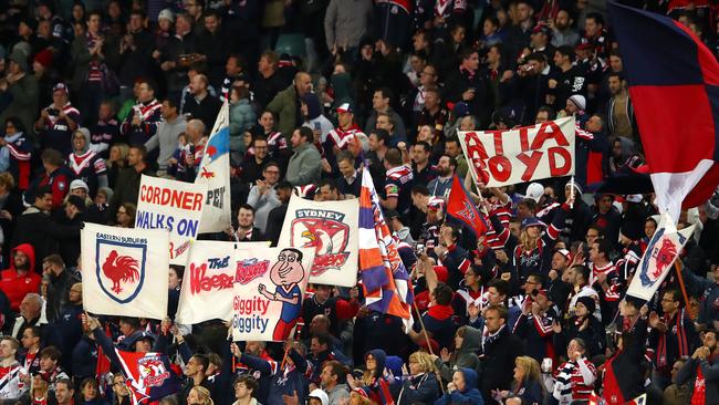 Roosters fans celebrate a try during the NRL qualifying final match against the Brisbane Broncos. Picture: Getty Images