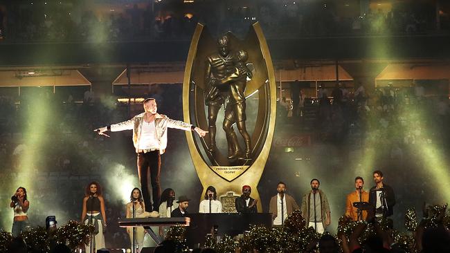 Macklemore performs ahead of the 2017 NRL Grand Final between the Melbourne Storm and the North Queensland Cowboys at ANZ Stadium, Sydney. Picture. Phil Hillyard