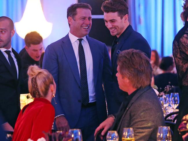 The pair mingle with Richard Wilkins and The Bachelor’s Matty J after the parade.