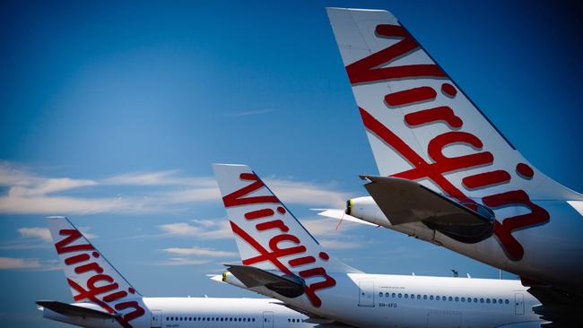 Virgin Australia aircraft parked at Brisbane Airport as the airline fights its way out of administration. Picture: AFP