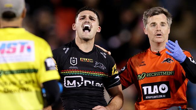 PENRITH, AUSTRALIA - AUGUST 15: Nathan Cleary of the Panthers reacts after taking a knock to his shoulder during the round 24 NRL match between Penrith Panthers and Melbourne Storm at BlueBet Stadium, on August 15, 2024, in Penrith, Australia. (Photo by Brendon Thorne/Getty Images)