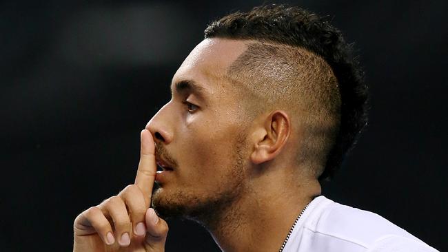 Nick Kyrgios gestures during his first round win. Picture: Wayne Ludbey