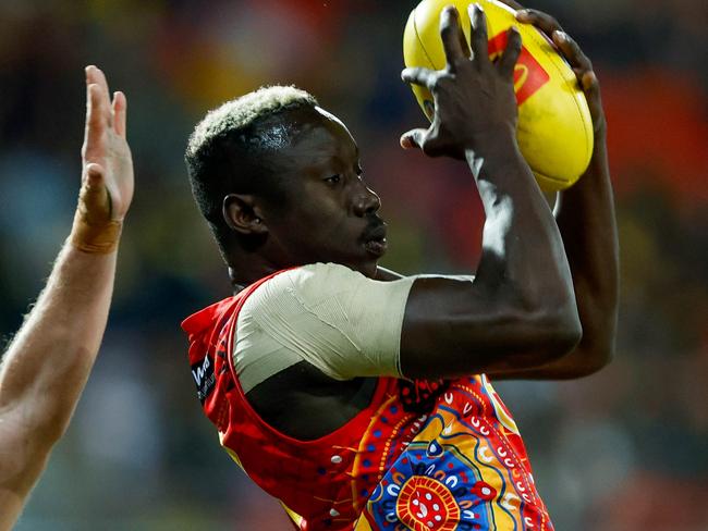 Mabior Chol had a special delivery for the club he left at the end of last season. Picture: AFL Photos/Getty Images