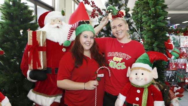 SANTA’S ELVES: Christmas Galore manager Staci Harnett and sales assistant Gabi Edwards.