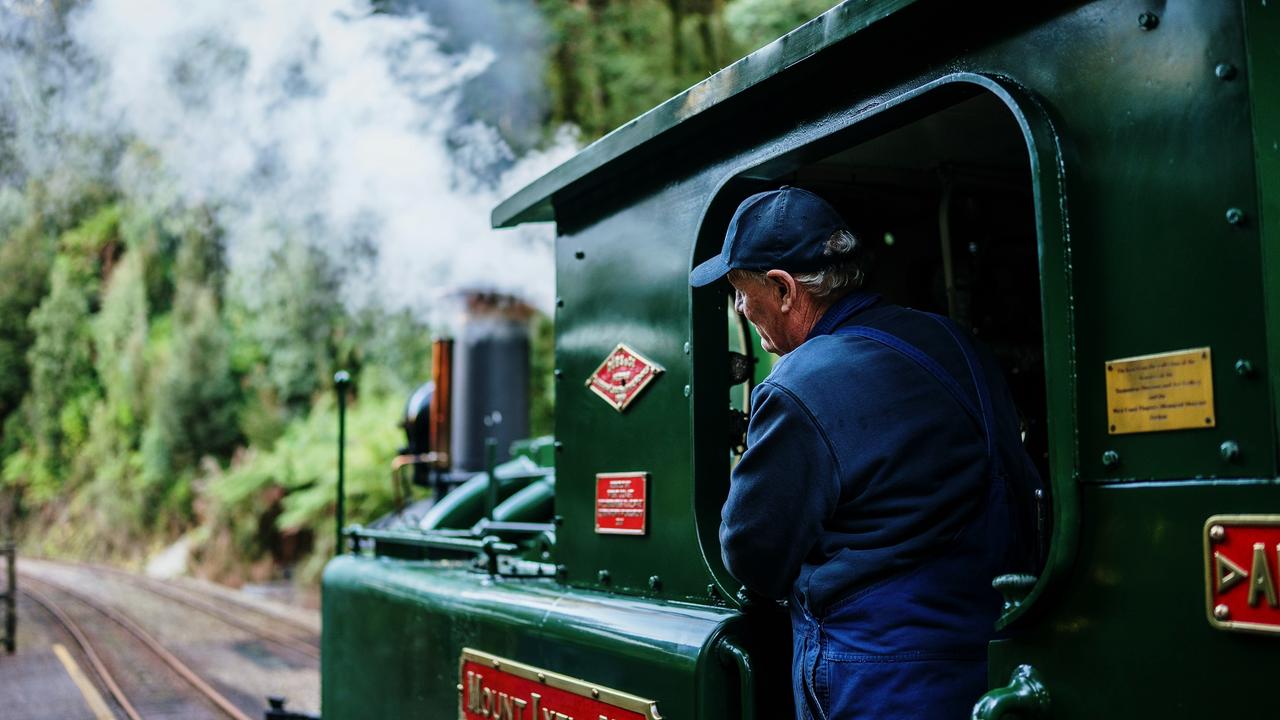 The “puffer nut” gets to ride shotgun in the cab alongside the driver and fireman through the rugged wilderness. Picture: Tourism Tasmania