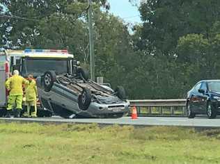 A man escaped serious injury despite being involved in this single vehicle rollover on the Warrego Highway on Friday, June 8. Picture: Gabrielle Hallesy