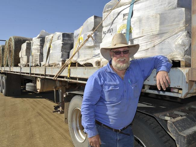 Angus Emmott in 2015, with a load of hay and cattle licks from NSW farmers to Queensland’s drought-affected, delivered in the Burrumbuttock Hay Run. Picture: Sam Rutherford