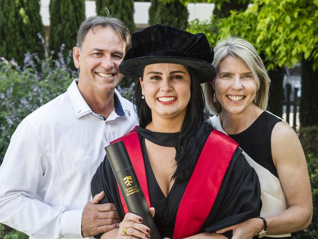 Doctor of Philosophy graduate Bianca Viljoen with parents Kobus and Aletta Viljoen at a UniSQ graduation ceremony at Empire Theatres, Tuesday, October 31, 2023. Picture: Kevin Farmer