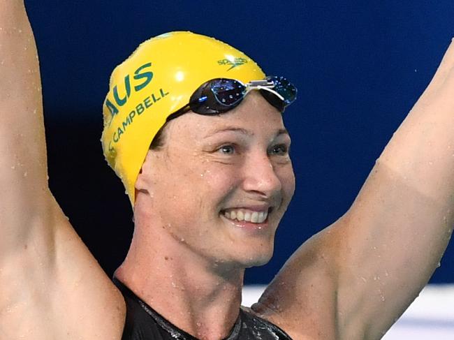 (L-R) Cate Campbell, Madeline Groves and Holly Barratt of Australia celebrate after winning  Women's 50m Butterfly Final on day four of swimming competition at the XXI Commonwealth Games at Gold Coast Aquatic Centre on the Gold Coast, Australia, Sunday, April 8, 2018. (AAP Image/Darren England) NO ARCHVIING, EDITORIAL USE ONLY