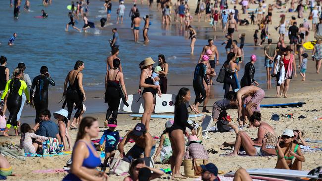 People are seen out enjoying the hot weather in Bondi Beach on Sunday as we continue Covid-19 Lockdown in Sydney: NCA NewsWire / Gaye Gerard