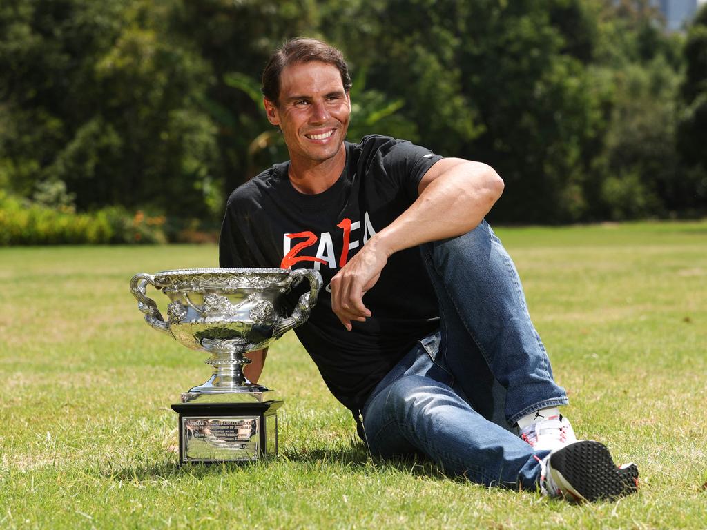 You’d be smiling too if you won this much. (Photo by Martin KEEP / AFP)