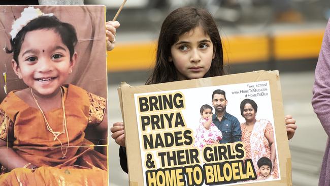 A young girl holds up a sign in support of the Queensland Sri Lankan family during a rally in 2018. Picture: AAP