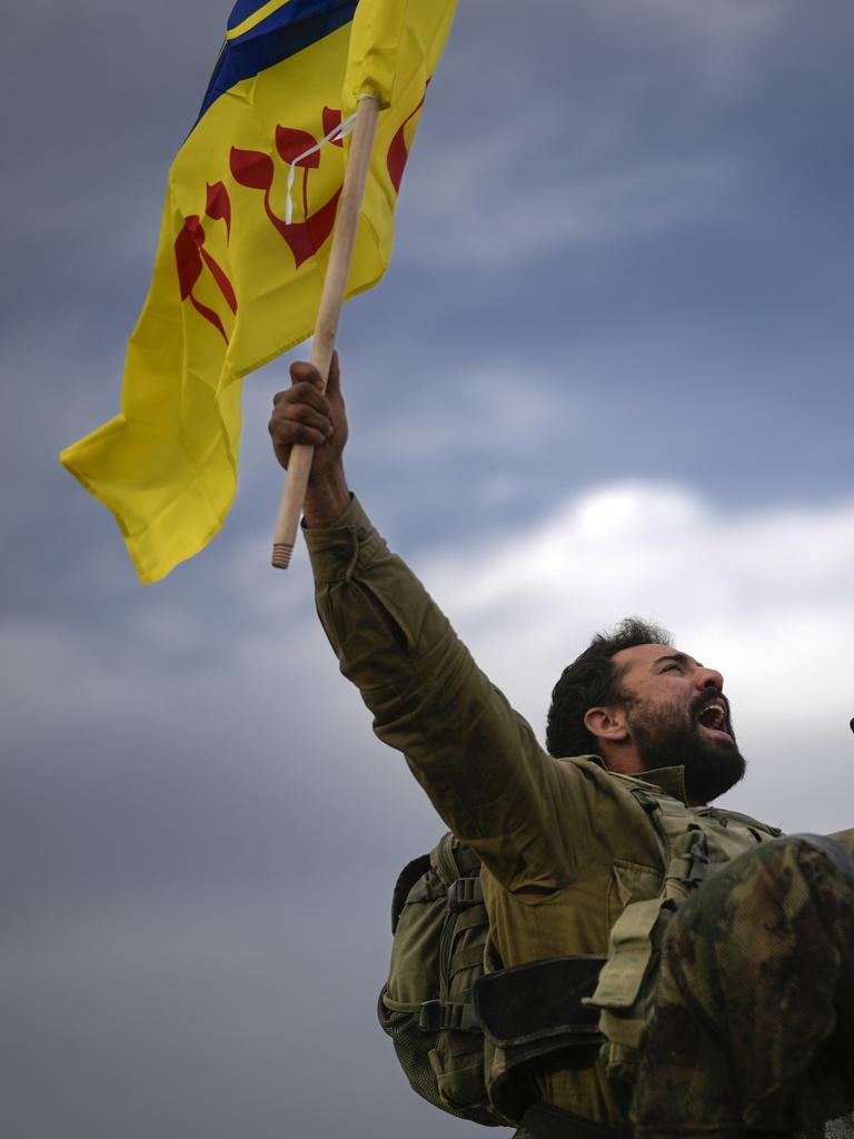 An Israeli soldier celebrates after returning from the Gaza Strip on November 22 ahead of the four-day ceasefire. Picture: Christopher Furlong/Getty Images