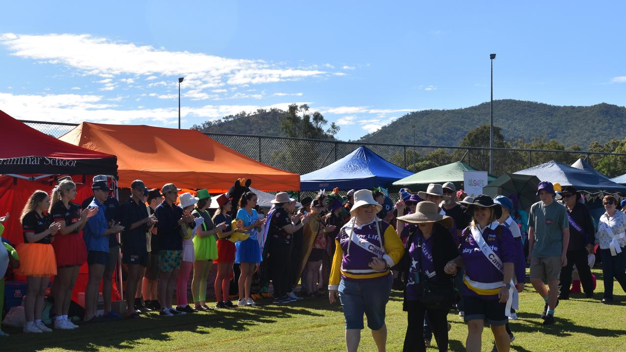 The survivor and carers lap kicking off the 2024 Rockhampton Relay for Life.