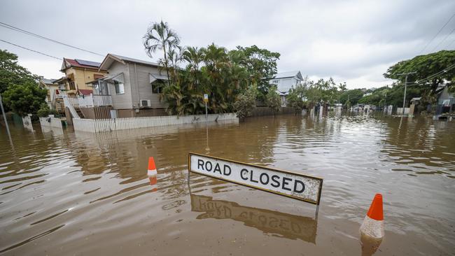BRISBANE, AUSTRALIA - MARCH 03: A road closed sign in a flooded Torwood Street, Auchenflower on March 03, 2022 in Brisbane, Australia. From Brisbane in Queensland to Lismore in northern New South Wales, flood-affected communities are cleaning up debris as the weather system moves south towards Sydney. (Photo by Peter Wallis/Getty Images)