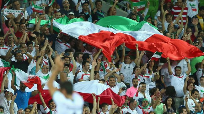 Iranian fans celebrate after the Asian Cup win over Bahrain.