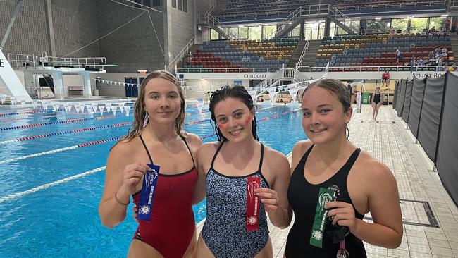 Olivia Watson, left, with Talia Bellette and Ava Crase.
