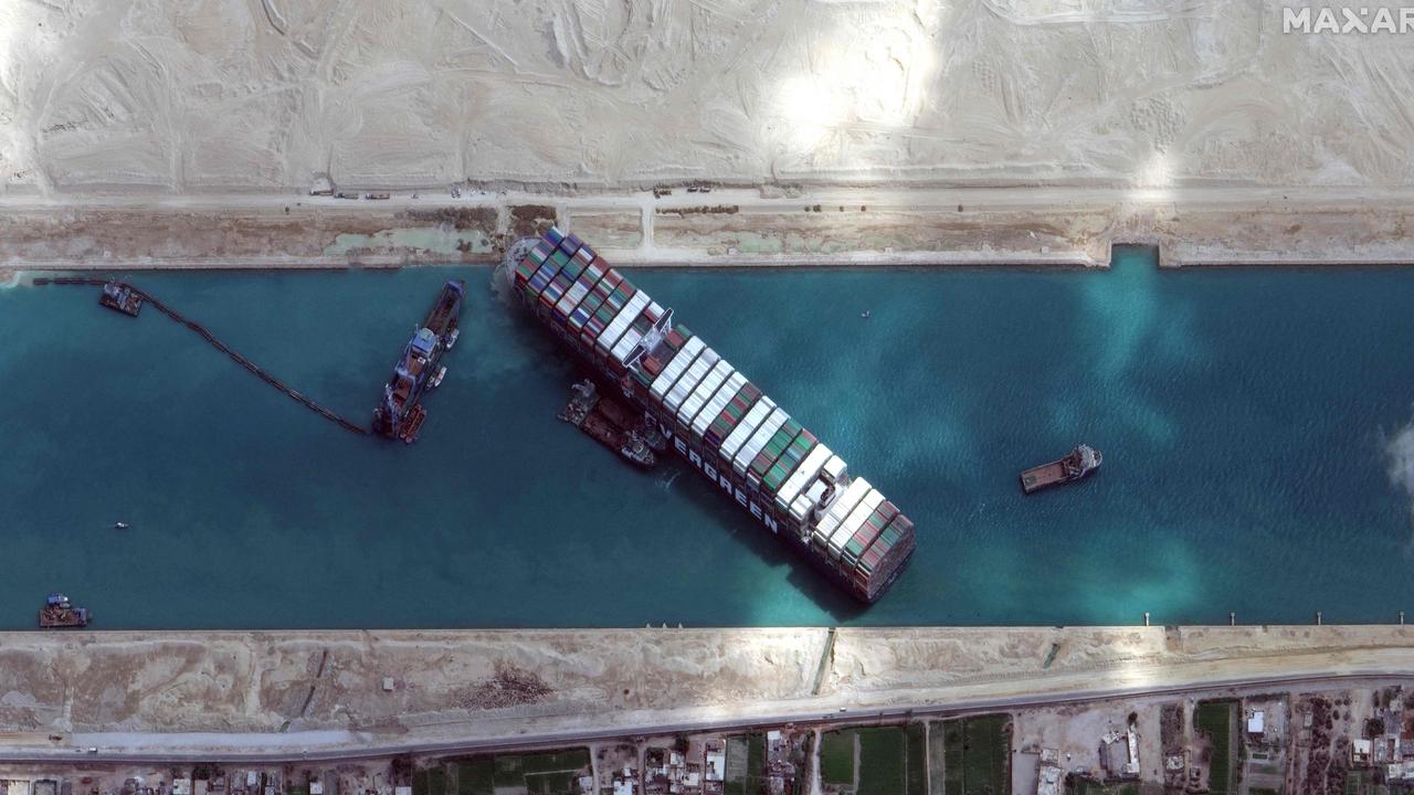 The MV Ever Given wedged in the canal. Picture: AFP/Maxar Technologies