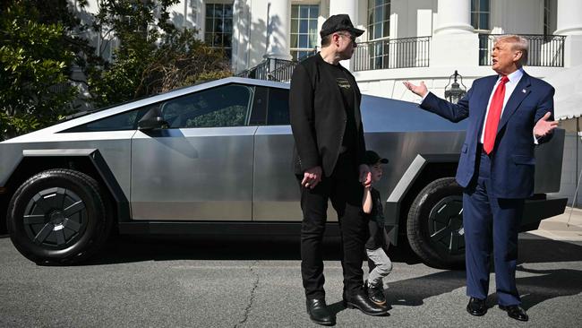 US President Donald Trump and Tesla CEO Elon Musk speak to the press as they stand next to a Tesla Cybertruck on the South Portico of the White House on March 11, 2025. Picture: Mandel Ngan/AFP