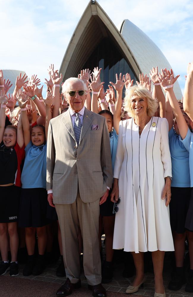 The royal couple pose for a photo with students. Picture: Chris Jackson/Getty Images