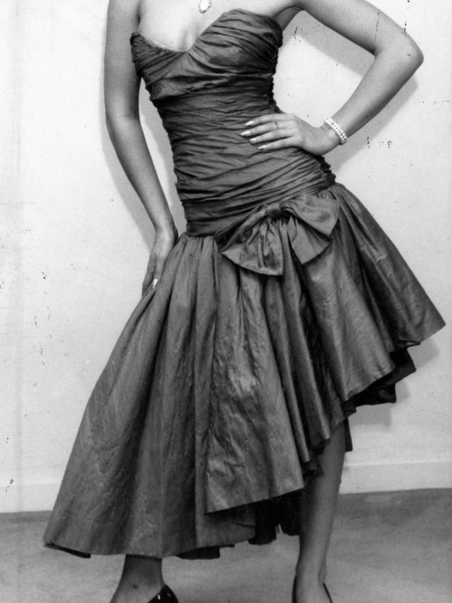 Model Teresa Robinson in a classic 1988 look: a Mariana Hardwick silk dress with an asymmetric skirt over tulle, a bow at the dropped waistline and ruched bodice.