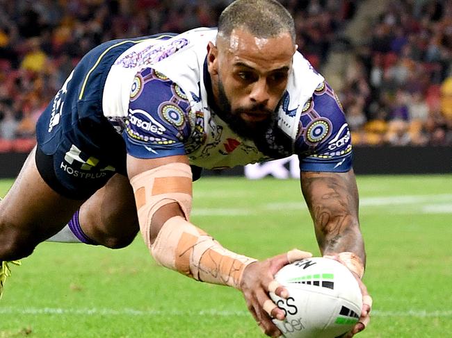 BRISBANE, AUSTRALIA - MAY 27: Josh Addo-Carr of the Storm scores a try during the round 12 NRL match between the Brisbane Broncos and the Melbourne Storm at Suncorp Stadium, on May 27, 2021, in Brisbane, Australia. (Photo by Bradley Kanaris/Getty Images)