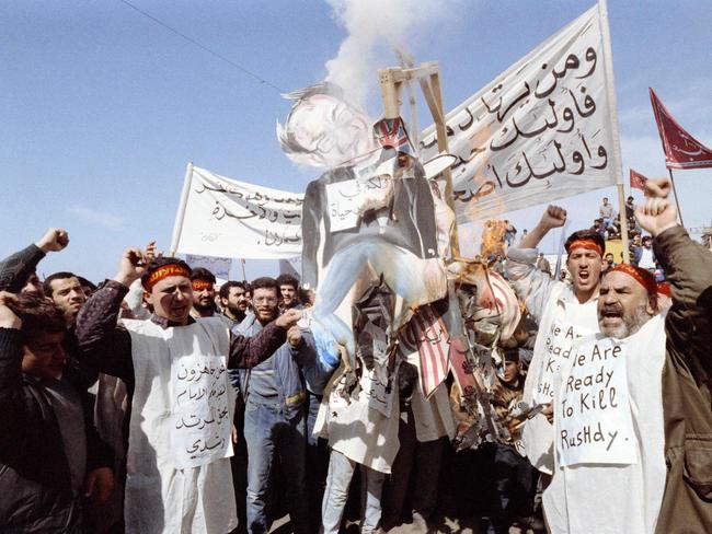 In this file photo taken in 1989, Iranian fundamentalists burn an effigie of Salman Rushdie who they accused of blasphemy for his "Satanic Verses" book. Picture: AFP