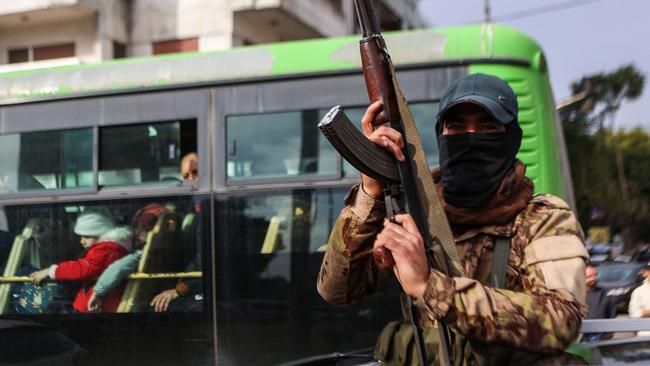 A fighter affiliated with Syria's in the western coastal city of Latakia. Picture: AFP.