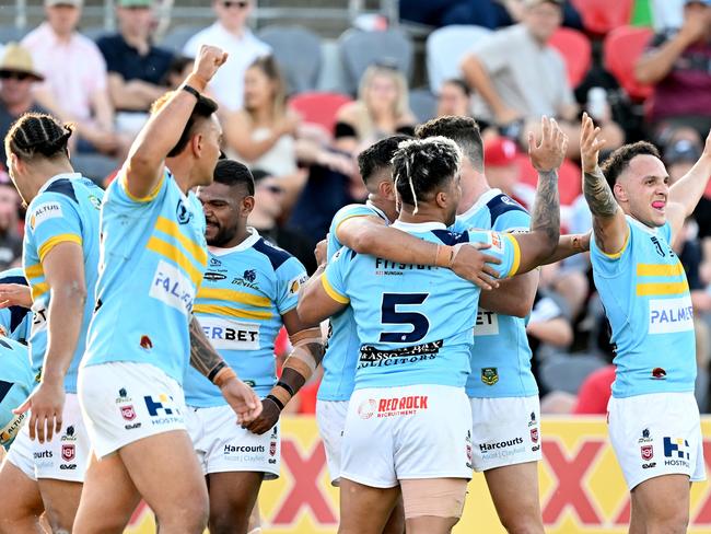 BRISBANE, AUSTRALIA - SEPTEMBER 24: The Devils players celebrate a try by Brayden McGrady of the Devils during the Queensland Cup Grand Final match between the Redcliffe Dolphins and the Norths Devils at Moreton Daily Stadium on September 24, 2022 in Brisbane, Australia. (Photo by Bradley Kanaris/Getty Images)